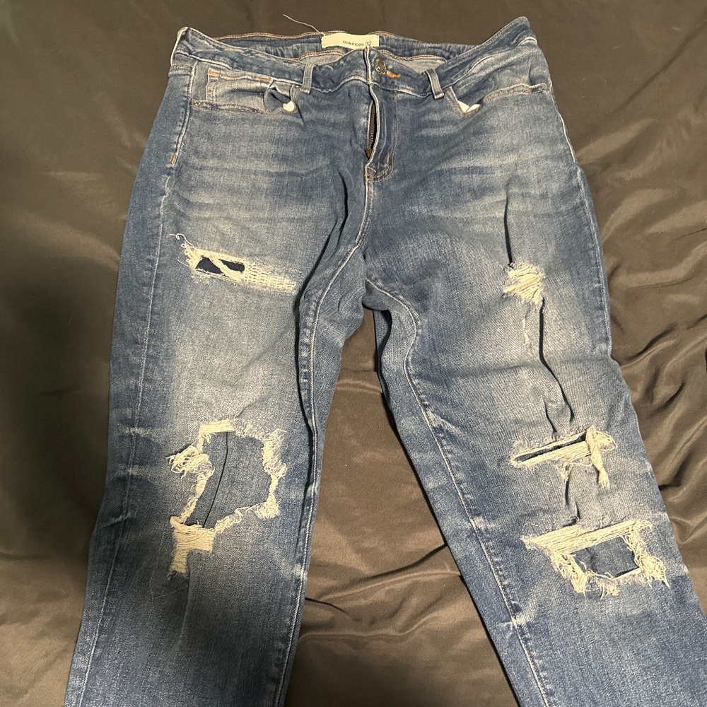 Womens destroyed jeans
